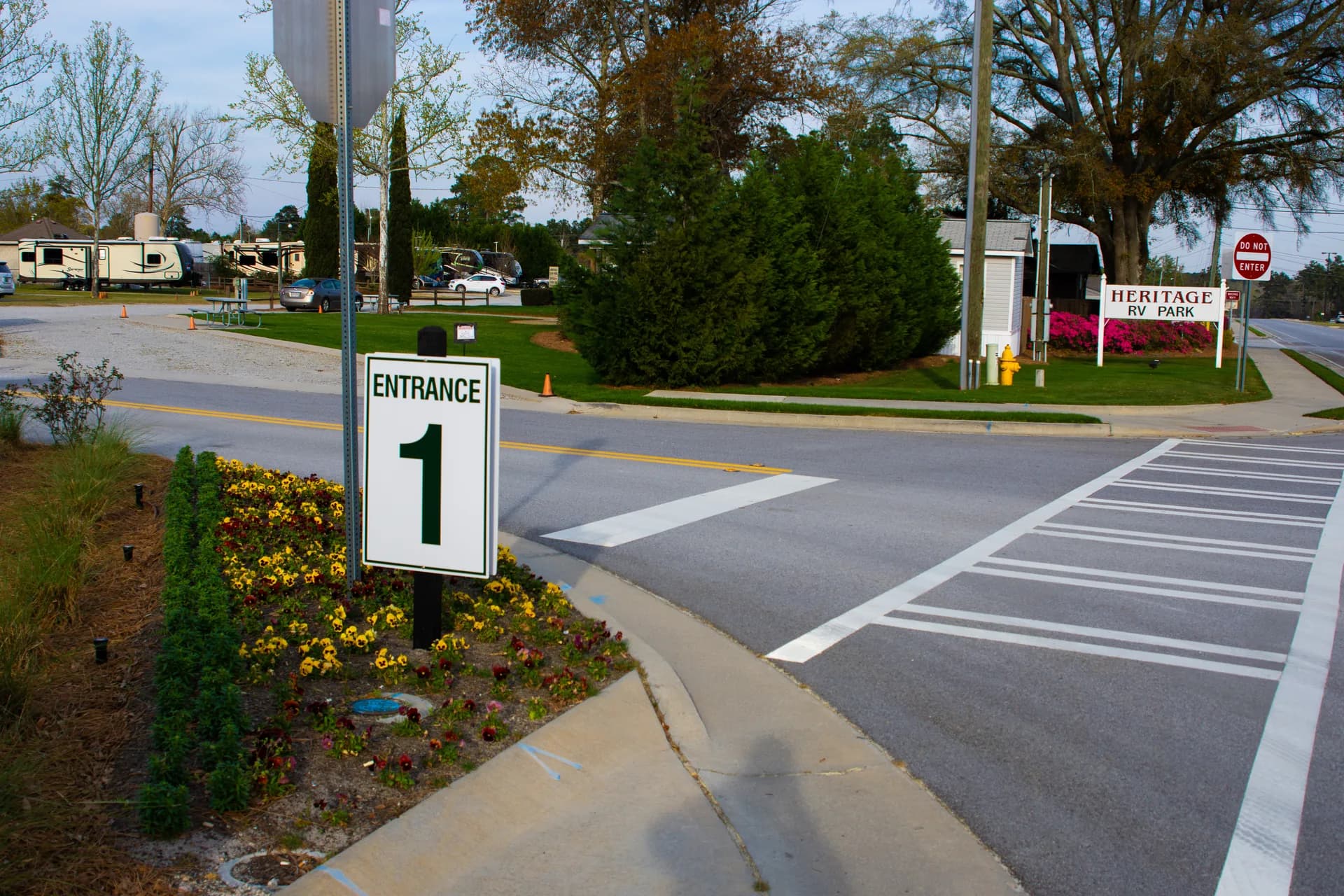 The Heritage RV Park sign and Entrance 1 wayfinding marker on Wrightsboro Road